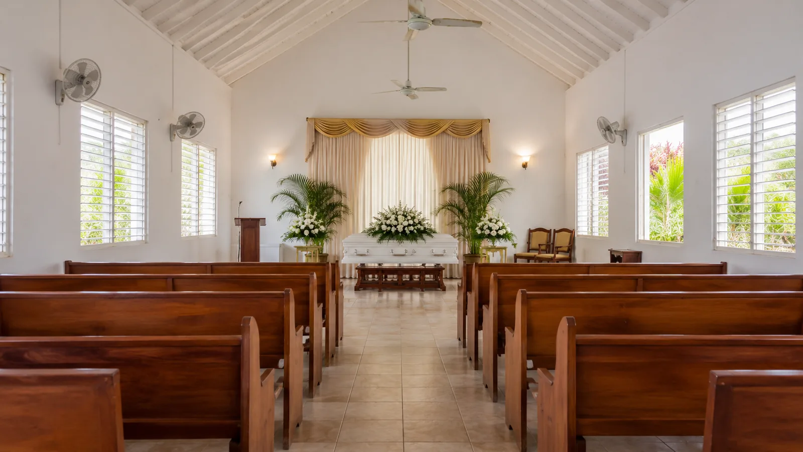 Quiet chapel interior, used as illustrative funeral service imagery